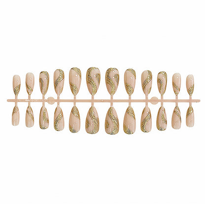 Künstlerisches Press-On Nagelset mit goldener Wirbel-Design Brehn
