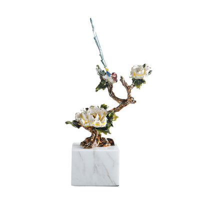 Zierliche Vogel- und Blumenskulptur