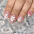 Detailliertes florales Design Press-On Nagelset Brehn