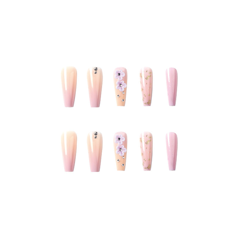 Kunstvolle Gel-Nägel mit Floral-Design und Glitzerakzenten Brehn