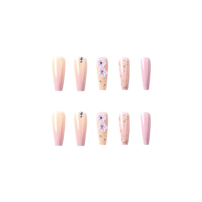 Kunstvolle Gel-Nägel mit Floral-Design und Glitzerakzenten Brehn
