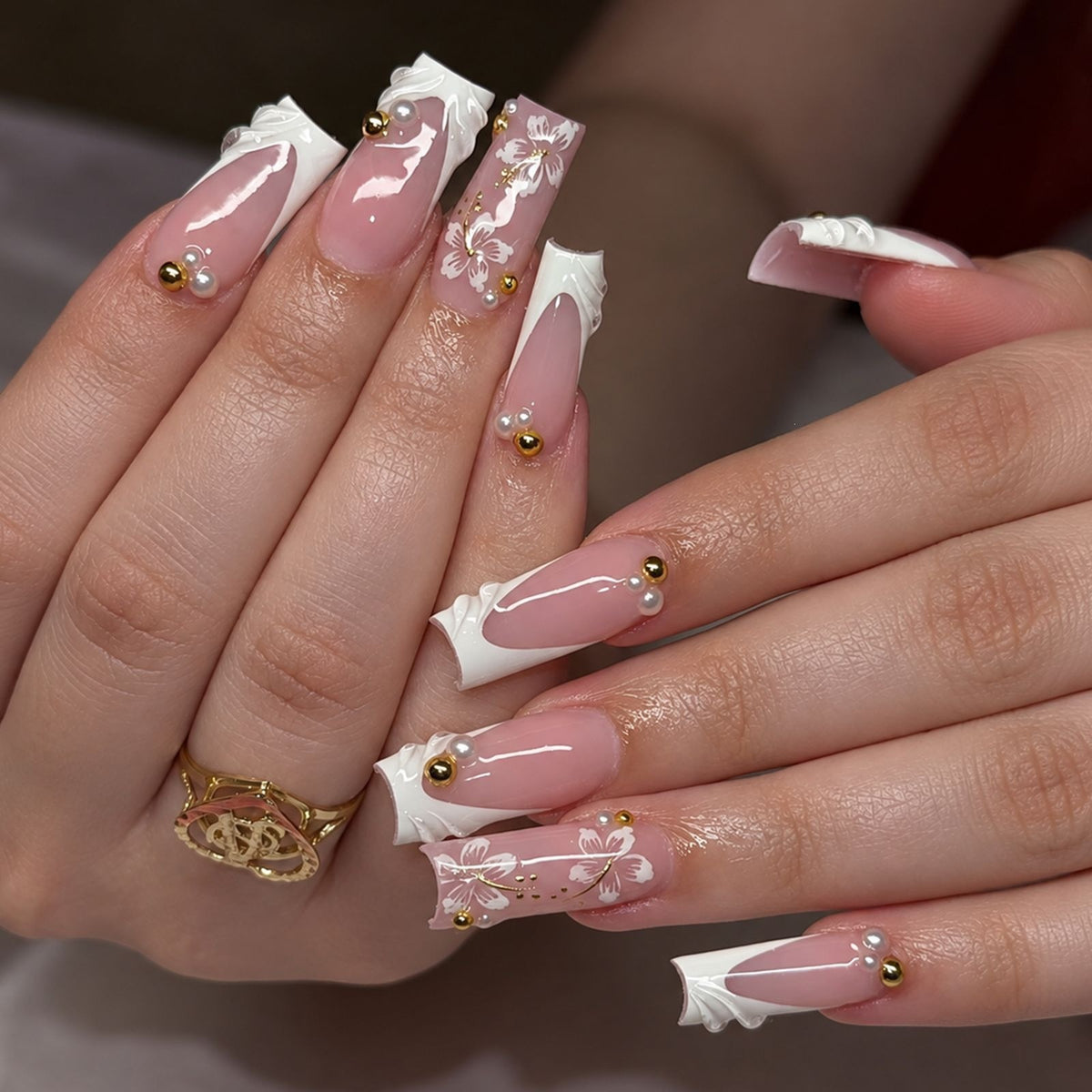 Kunstnagelset mit kunstvollen Blütenmotiven Brehn