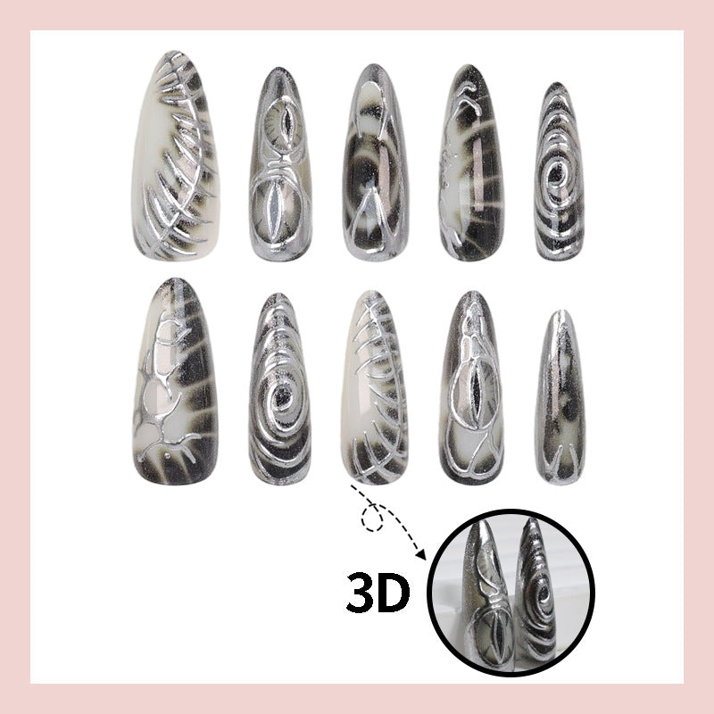 Kunstnagelset mit modernem Spiralmuster und glänzenden Akzenten Brehn