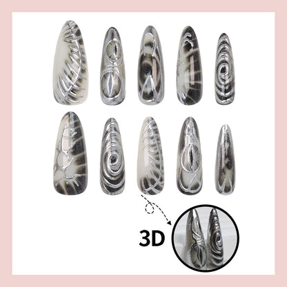 Kunstnagelset mit modernem Spiralmuster und glänzenden Akzenten Brehn