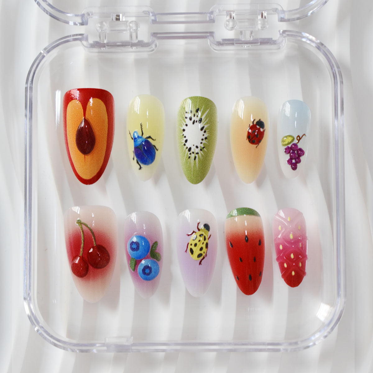 Kreative Obst- und Insekten-Themen Presse-auf-Nagelkunst Brehn