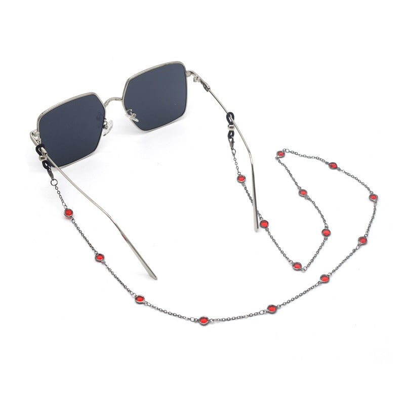 Stylische quadratische Sonnenbrille mit dekorativer Kette Brehn