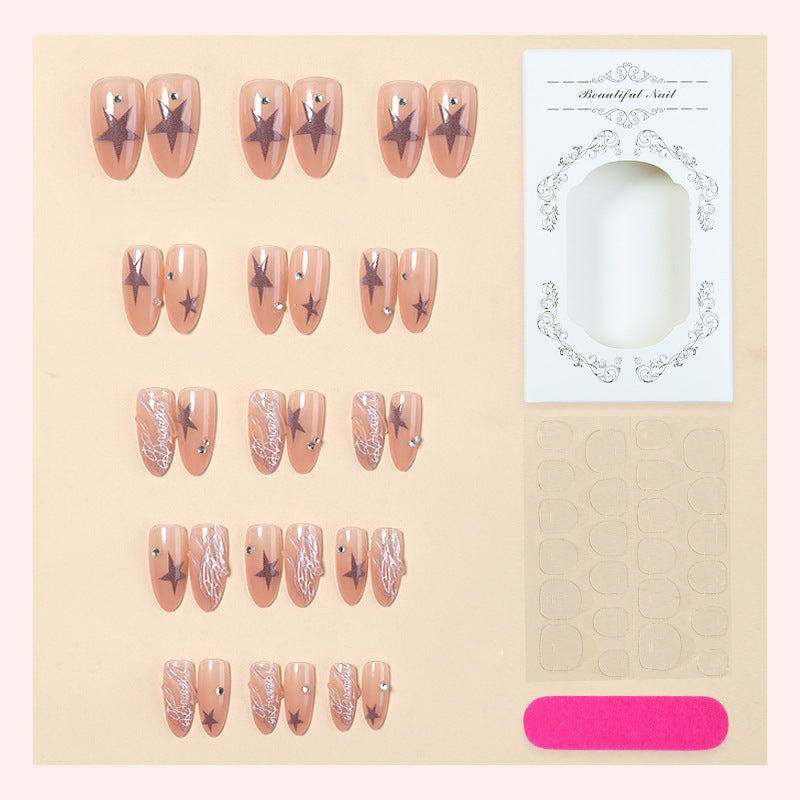 Künstlerisches Press-On Nail Set mit Stern- und Perlenakzenten Brehn
