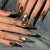 Künstlerisches Press-On-Nagelset mit luxuriösen Edelsteinakzenten Brehn
