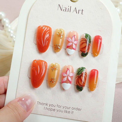 Kunstnagelset mit floralen und herbstlichen Designs Brehn