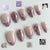 Kunstnagelset mit glamourösen Spitzenakzenten Brehn
