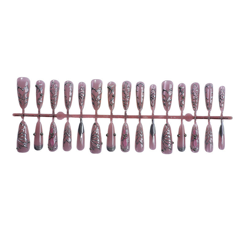Elegante Kunstnägel mit filigranen Mustern Brehn