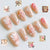 Kunstnagelset mit floralen Motiven und Strassverzierungen Brehn