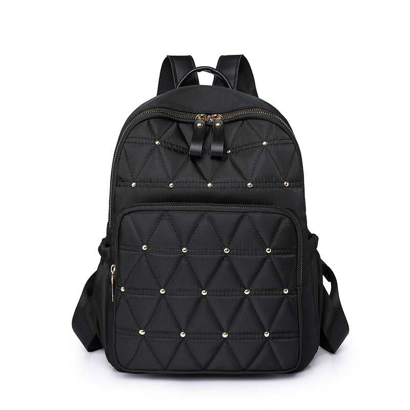 Stylische gesteppten Rucksack mit goldenen Akzenten