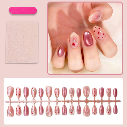 Kunstnagelset mit romantischen Herzen und eleganten Schleifen Brehn