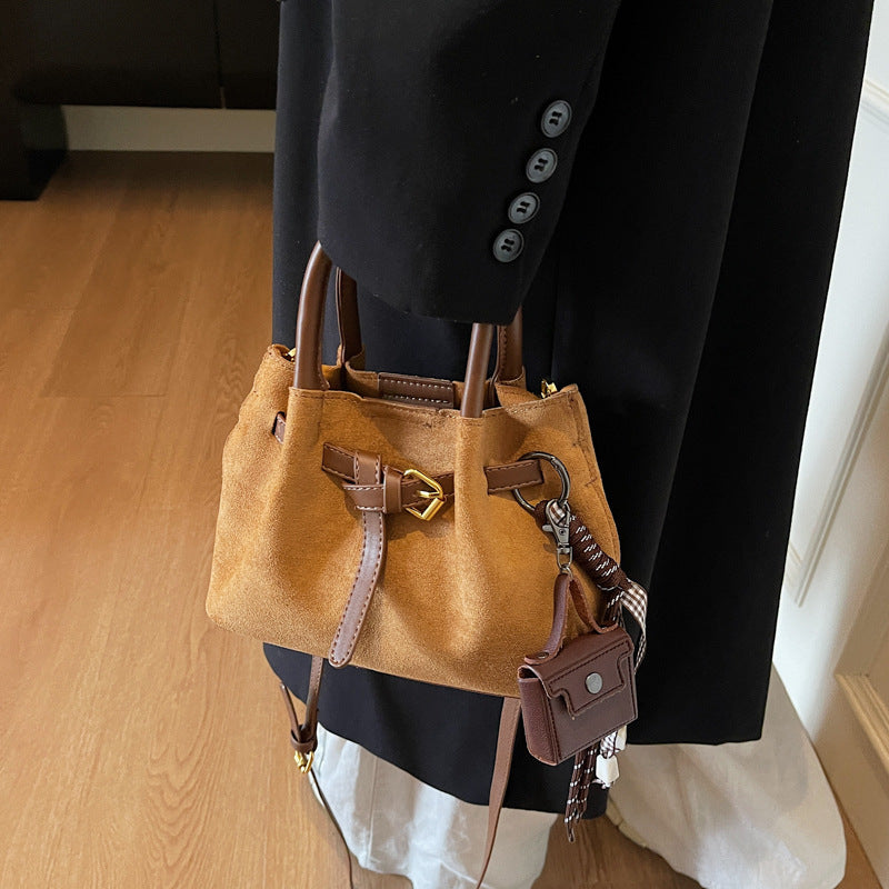 Elegante Wildleder Handtasche Brehn