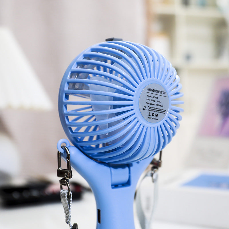 Tragbarer Mini-Lüfter für Damen mit Sprühfunktion und flexiblem Montagesystem Brehn