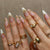 Künstlerisches Press-On-Nagelset mit eleganten Designelementen Brehn
