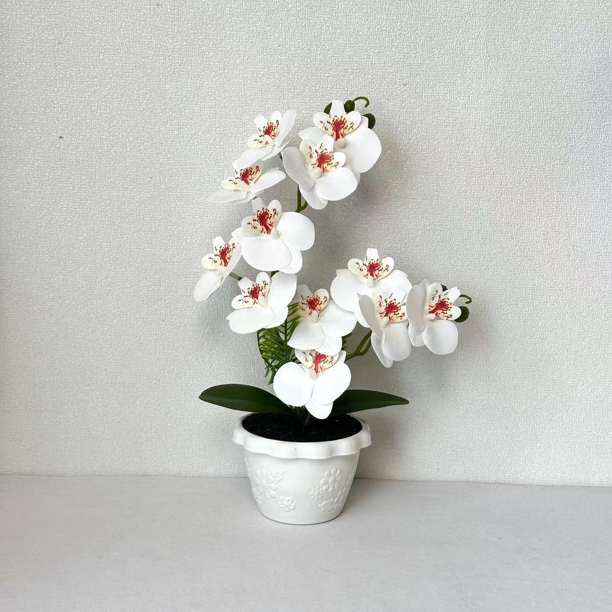 Elegante Künstliche Orchideen Blumenarrangement für die Innendekoration Zuhause