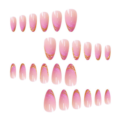 Elegante Stiletto Press-On Nagelverlängerungen mit Goldspitzen-Detail Brehn