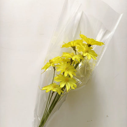 Vibrant künstlicher Blumenstrauß mit stilvoller Verpackung