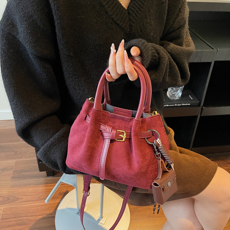 Elegante Wildleder Handtasche Brehn