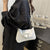 Elegante Schleifen-Detail Schultertasche Brehn