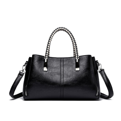 Elegante geflochtene Handtasche Brehn