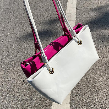Glänzende Patentanleder-Handtasche