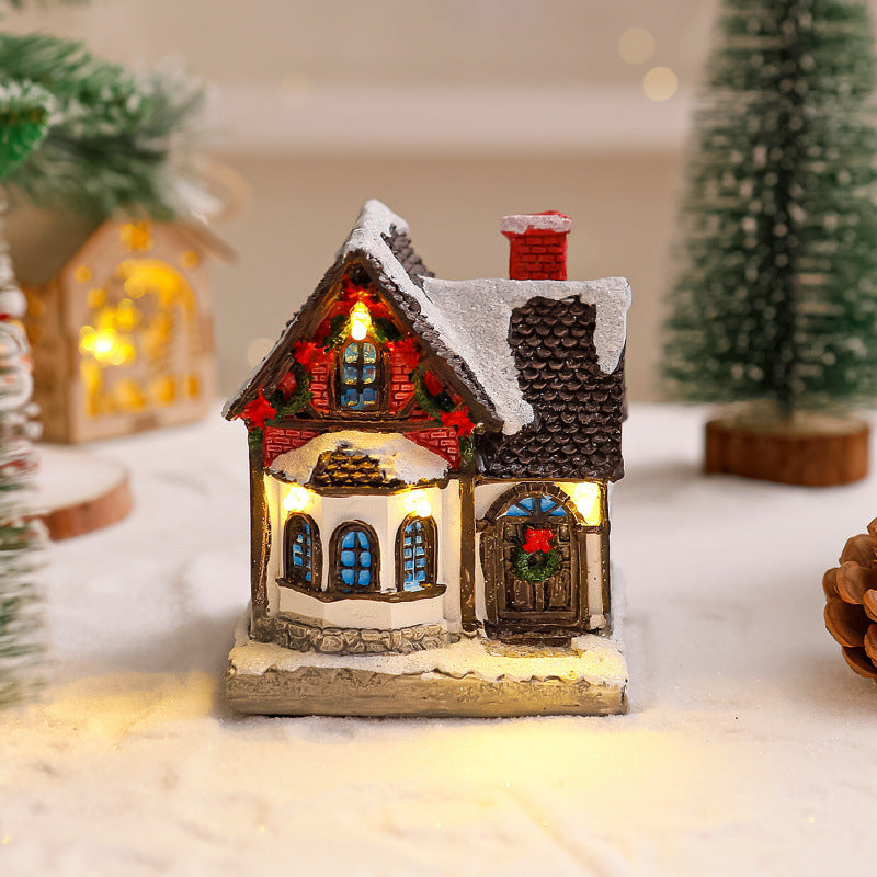 Dekoratives Weihnachtsdorf mit Lichtern Brehn