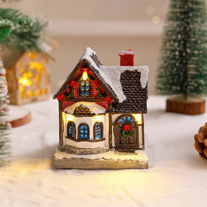 Dekoratives Weihnachtsdorf mit Lichtern Brehn