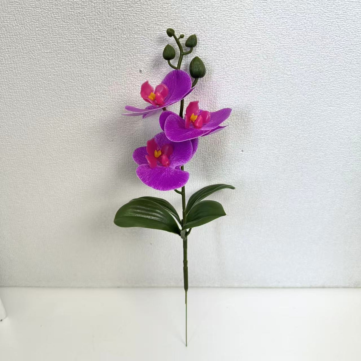 Künstliches Orchideenblütenarrangement für dekorative Wohnraumausstellung