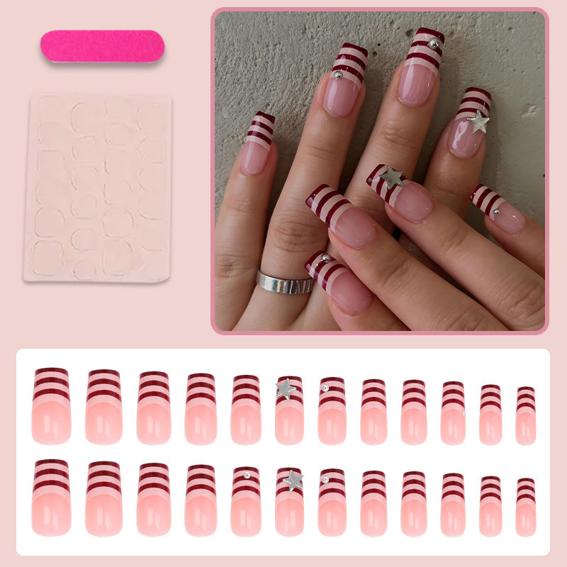Kunstnagelset mit modernem Streifen-Design und funkelnden Sternen Brehn