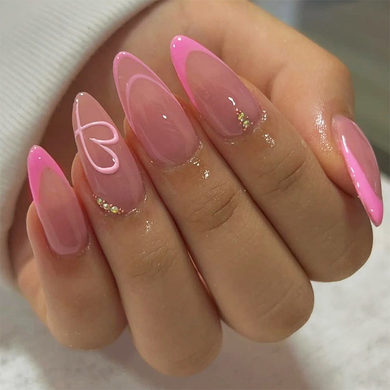 Kunstnagelset mit eleganter Herz- und Glitzerverzierung Brehn