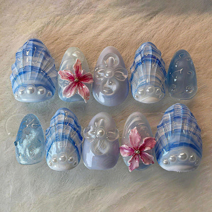 Künstlerisches floral und Muschel-Design Press-On Nagelkunst Set Brehn