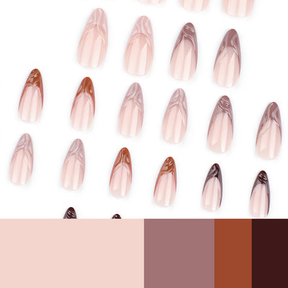 Kunstvolle Stiletto-Nägel mit elegantem Farbverlauf und Glitzerakzenten Brehn