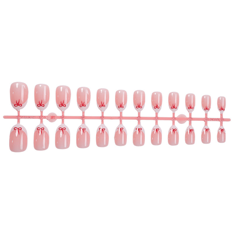 Kreatives, mit Schleife verziertes Druck-Nagel-Set Brehn