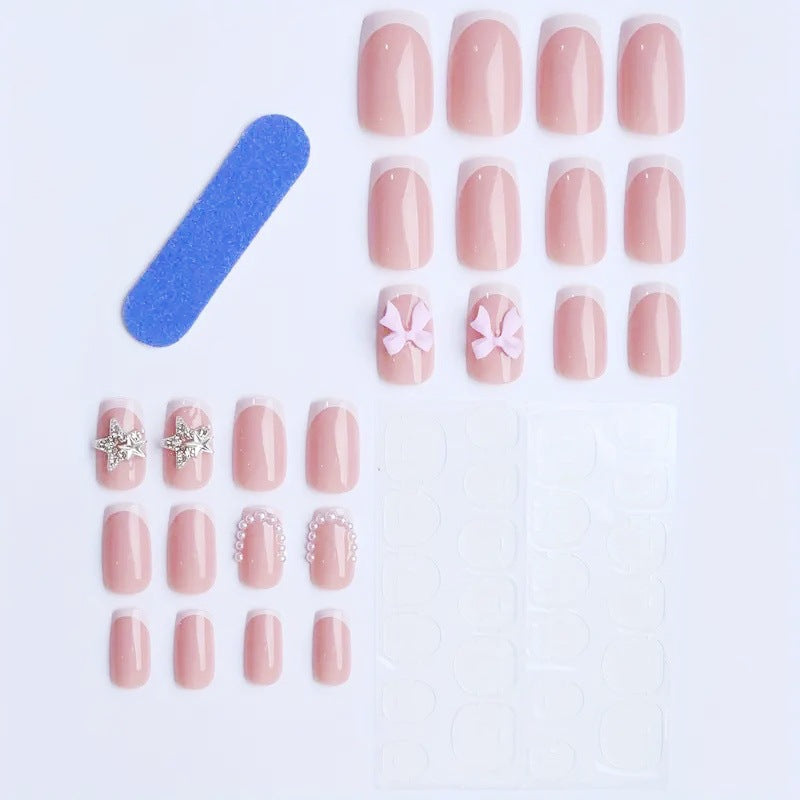 Künstliche Nagelspitzen mit glamourösem Schleifen und Strass-Design Brehn