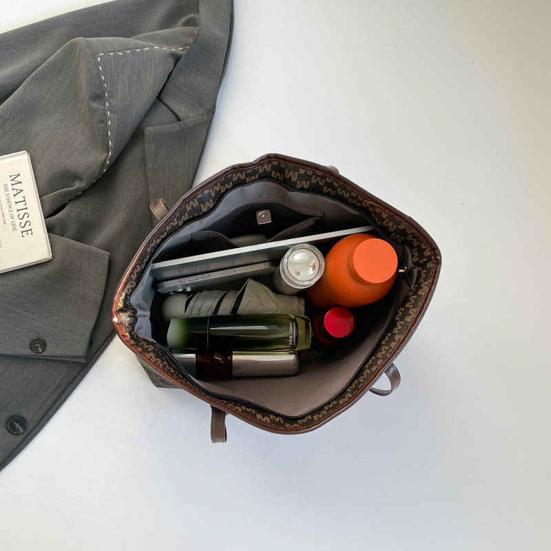 Stylische Flockmuster-Tasche mit dekorativem Bogen
