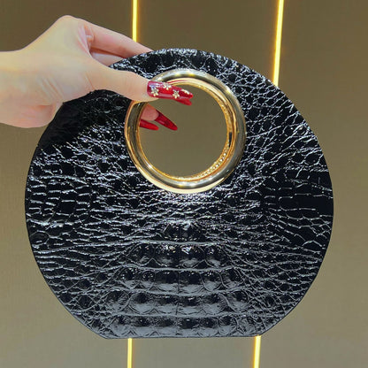 Rundering-Handtasche