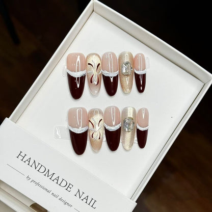 Künstlerische Press-On Nagelkunst Kollektion mit Edelsteinakzenten