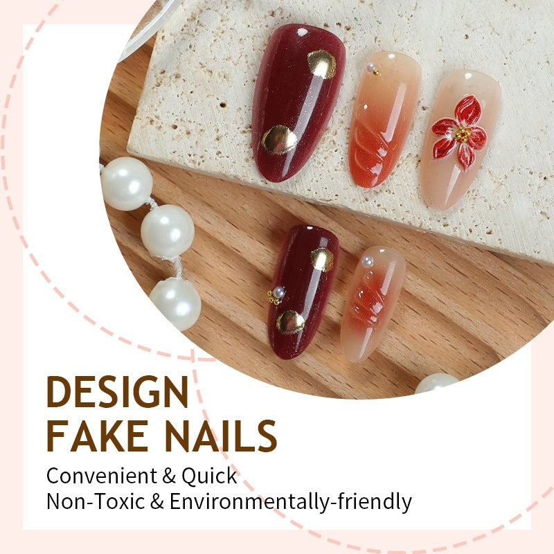 Kunstnagelset mit eleganten floralem Akzenten und Glitzerdetails Brehn