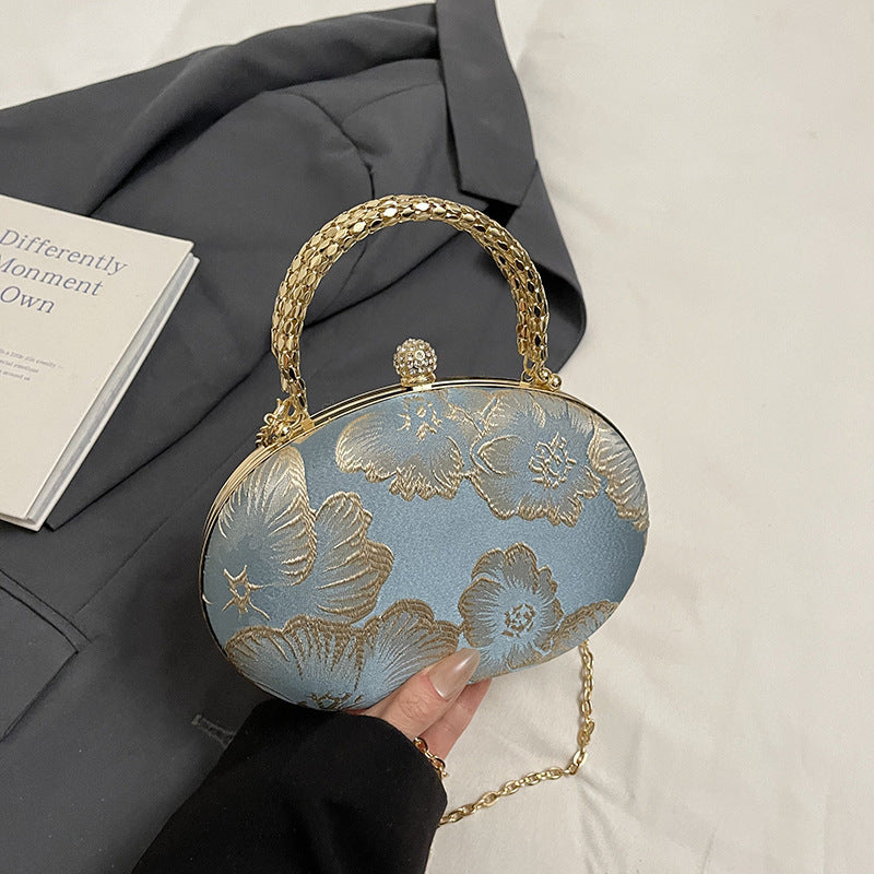 Elegante Blumen Abendtasche Brehn