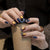 Dekoratives Press-On Nagelkunstset mit Glitzer und floralen Akzenten Brehn
