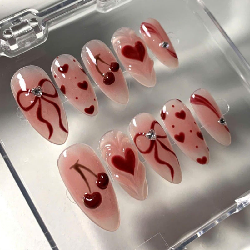 Kunstnagelset mit romantischen Herz- und Kirschmotiven Brehn