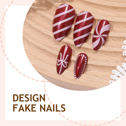 kunstvoll gestaltetes Nagelset mit festlichen Zuckerstangen-Motiven Brehn