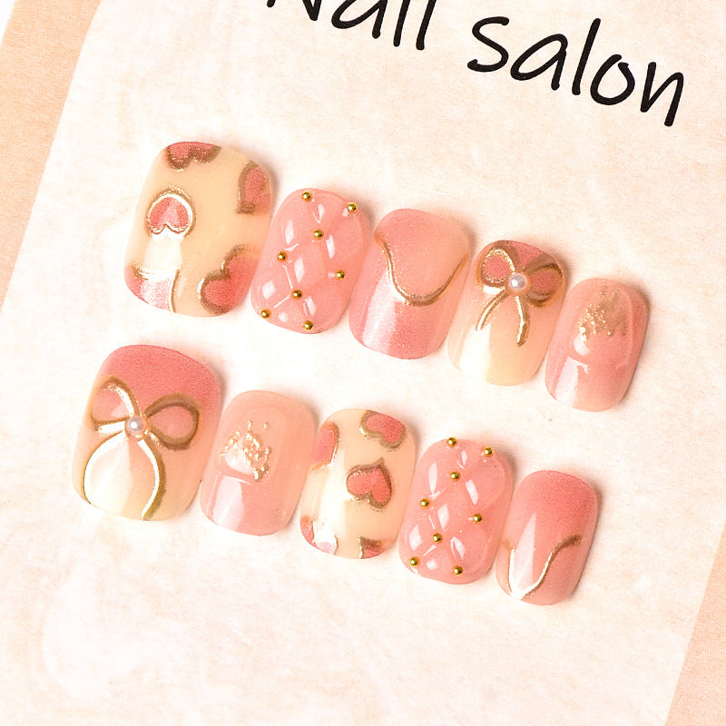 Elegantes Herz- und Band-Thema Press-On Nagelset Brehn