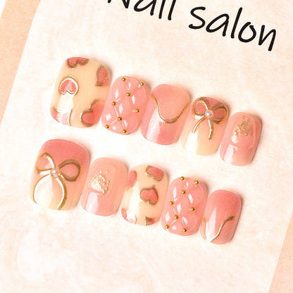 Elegantes Herz- und Band-Thema Press-On Nagelset Brehn