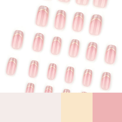 Kunstvolle Nagelverlängerungen mit Glitzer- und Golddetails Brehn
