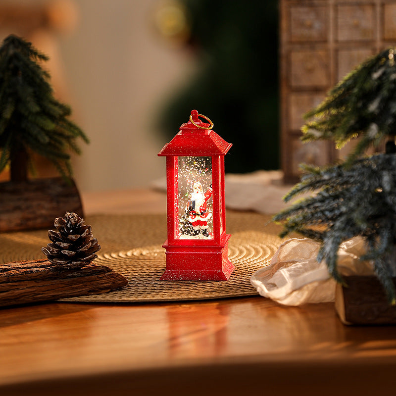 Beleuchtete Weihnachtslaterne mit glitzerndem Schneemann-Szenario Brehn