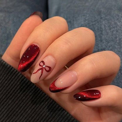 Kunstnagelset mit luxuriösen Ombre-Effekten und filigranen Schleifen Brehn